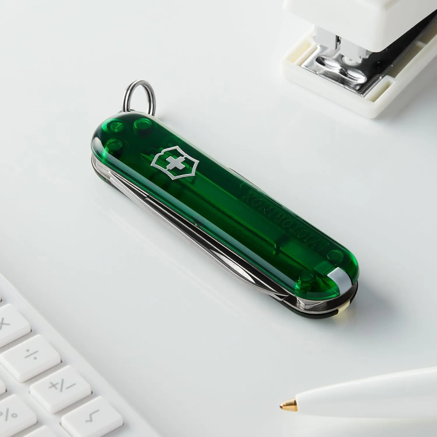 Victorinox Classic SD Swiss Army Knife, Compact 7 Function Swiss Made Pocket Knife with Small Blade, Screwdriver and Key Ring - Emerald