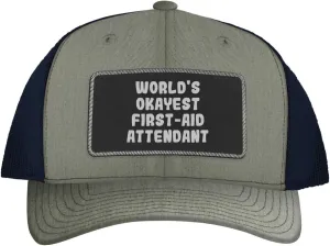 World's Okayest First-Aid Attendant - Leather Black Patch Engraved Trucker Hat