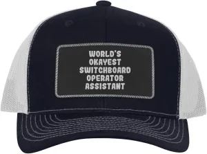 World's Okayest Switchboard Operator Assistant - Leather Black Patch Engraved Trucker Hat
